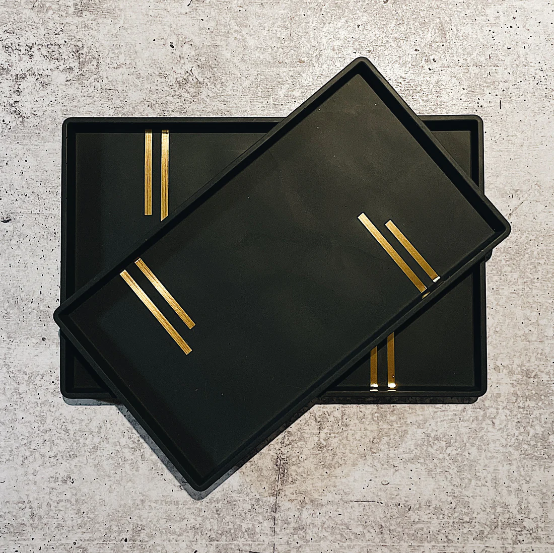 gold and black tray